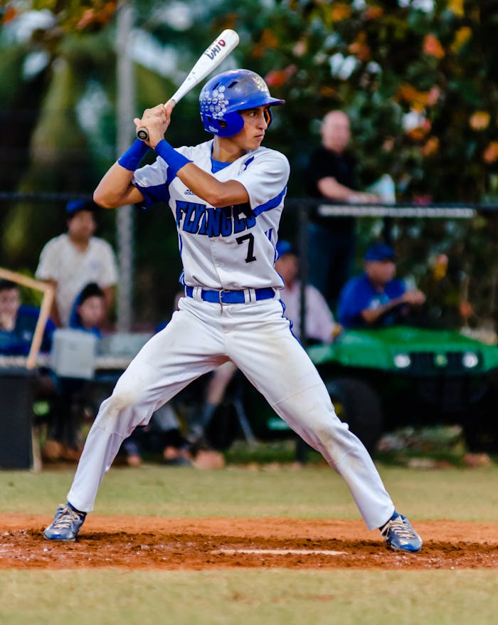 pexels-photo-896567 Person Holding Baseball Bat